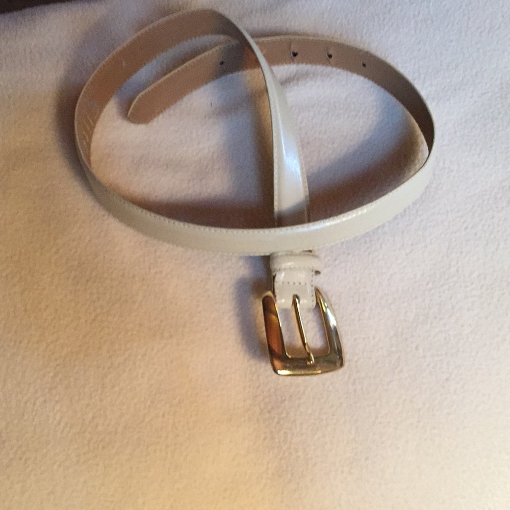 Cream color letter belt with goldtone buckle